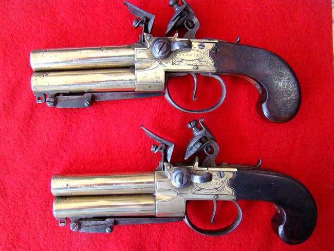 A fine pair of British flintlock pistols with brass over and under barrels with folding bayonets by L.Samuel of Liverpool circa 1780-1800. — image 2